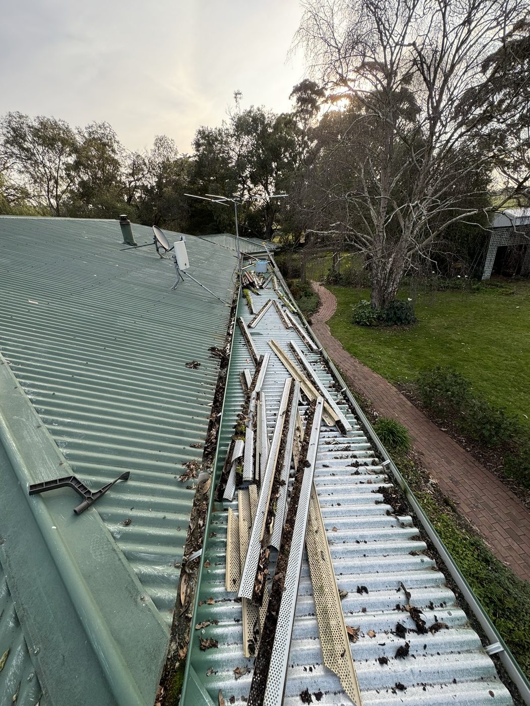 Gutter guard removal for cleaning access